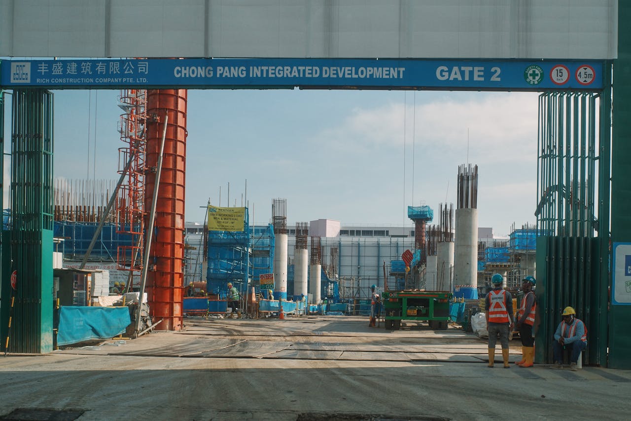 The Art of Drawing Readers In: Your attractive post title goes here Industrial construction activity at the Chong Pang Integrated Development, showcasing structural work.